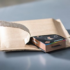 An ecommerce product is unboxed from inside a cohesive mailerbox.